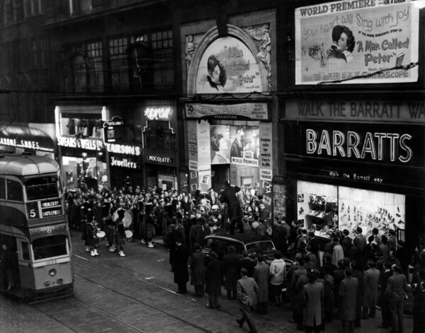 crowds outside la scala cinema watch celebrities arrive for the world premiere of film, a man called peter, sauchiehall street, glasgow, scotland, 30th march 1955.